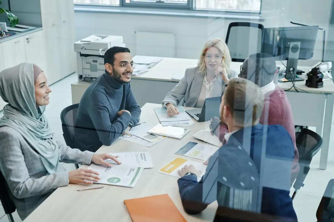 Advisors in a meeting around a conference table